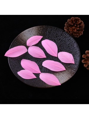 Перья декоративные,цв-розовый,размер 5-7 см,цена за 50 шт